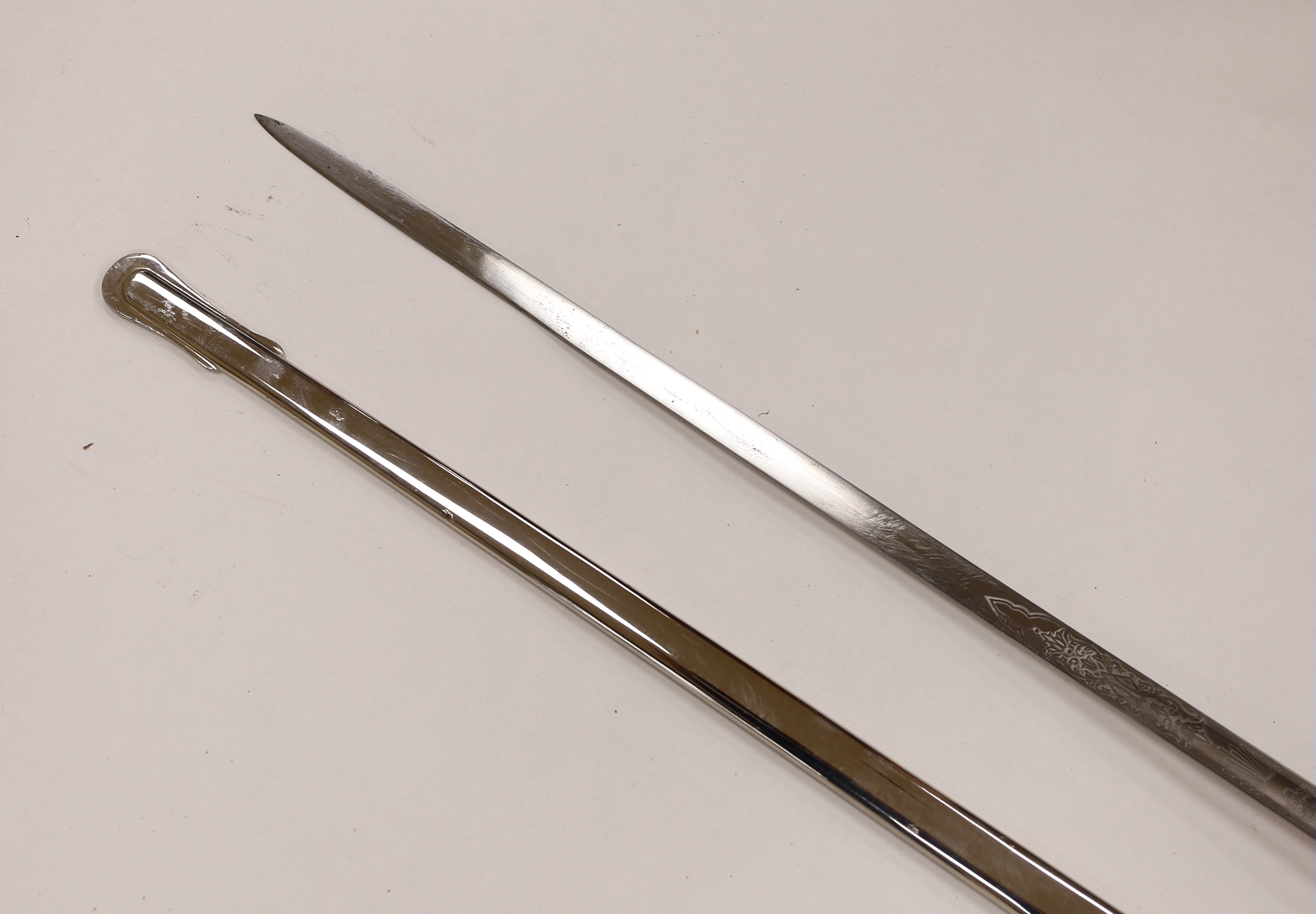 A George V officer's sword, maker Hawksworth Sheffield, in chromed scabbard, blade 82cm